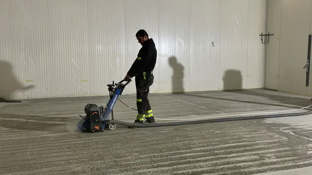 Photo report: preparing and cutting joints in a concrete floor, photo 5